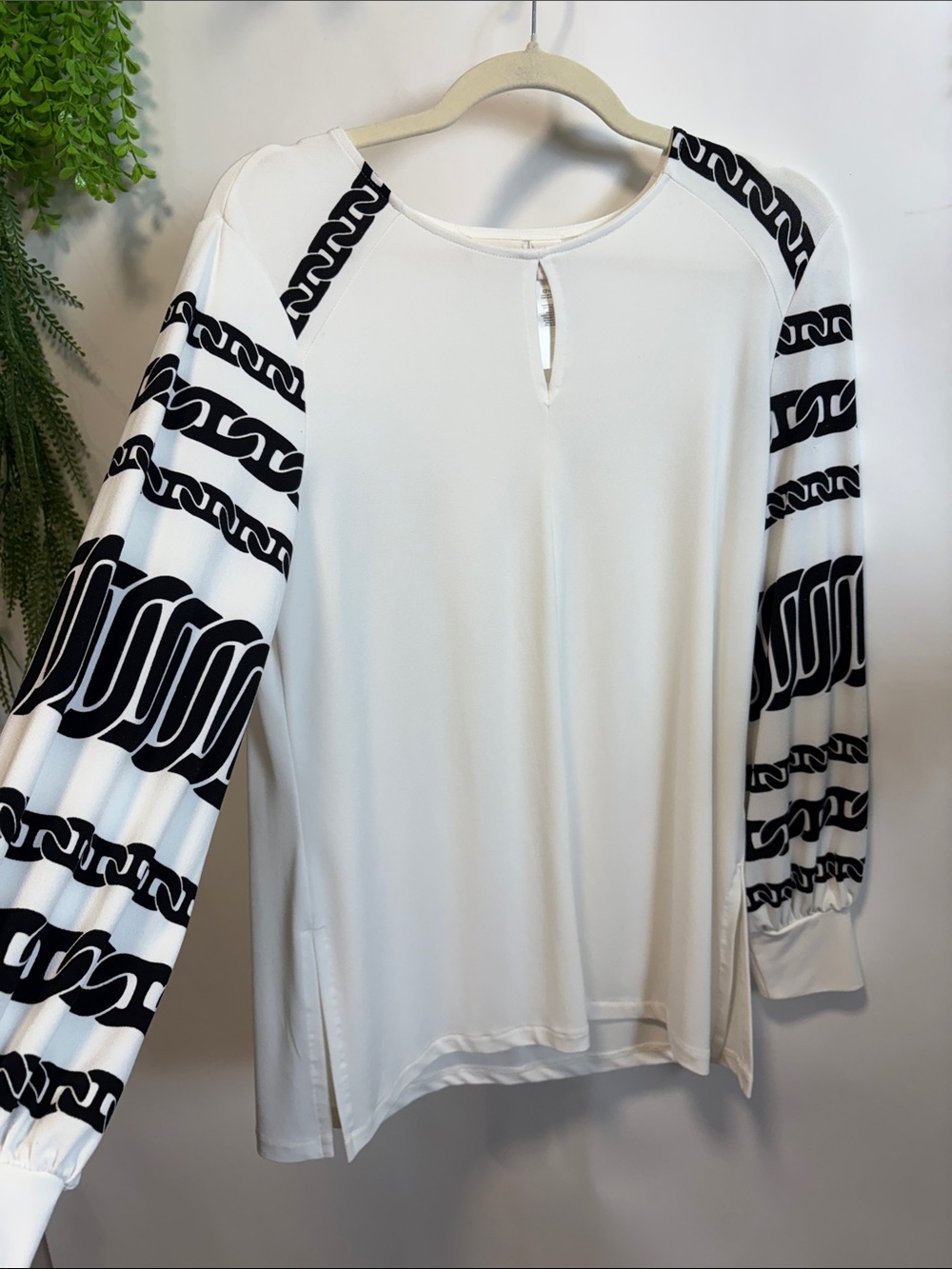 Chico's White Tunic with Black Chain-Pattern Sleeves